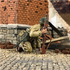 U.S. Infantryman Kneeling Watching for Movement, 1945-45