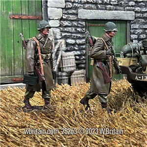 Heading up the Line Two U.S. Infantry Marching in Greatcoats, 1943-45